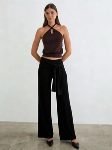 Women's dark brown halter neck top and black lace-up high-waist wide-leg pants set