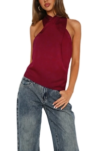 Detail of the elegant wine red satin halter top with cross pleated neckline and glossy fabric
