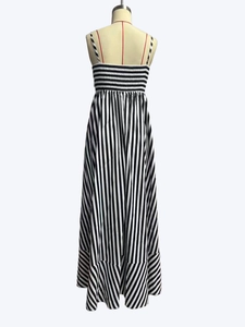 Detail view of smocking chest design and black white vertical stripes on summer maxi dress