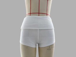 Rear view detail of white ribbed knit sports shorts with wide fold-over waistband design
