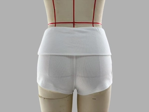 Detail view of white high-waisted ribbed shorts with wide fold-over waistband back