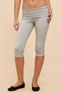 Close-up of heather grey high-waisted cropped leggings in soft elastic knit fabric