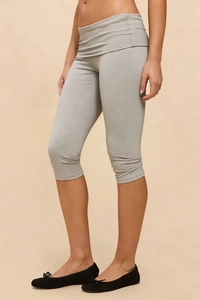 Side view of light grey high-waisted cropped leggings with a textured jersey finish
