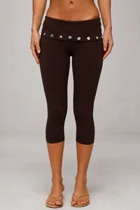 Front view of brown high-waist capri leggings featuring decorative buttons on the waistband