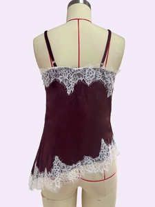 Back view of burgundy satin camisole top with delicate white eyelash lace detailing
