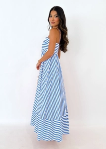 Side view of striped sundress featuring A-line silhouette and blue-white pattern