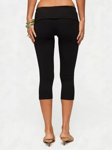 Women high waisted black capri yoga pants featuring a flattering peach butt lift design