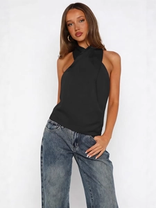 Women's black sleeveless halter top with cross neck design and slim fit silhouette