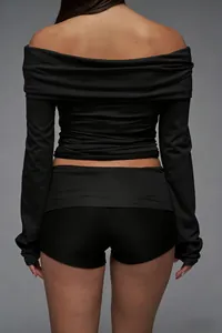 Rear view of black off-shoulder long sleeve top and slim-fit high-waist shorts set