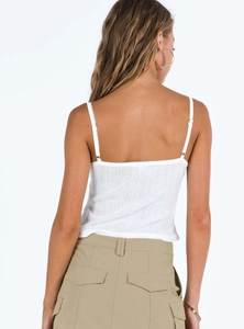 Detail of white ribbed camisole top featuring lace trim and sleek thin straps on back