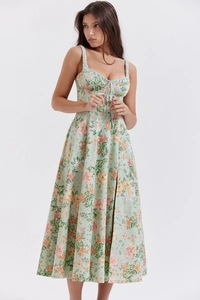 Detailed view of bustier bodice with drawstring tie on green floral midi dress