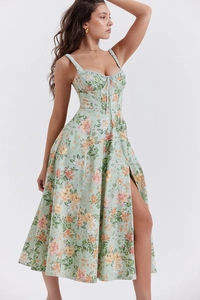 Detail view of the floral midi dress featuring a sweetheart neckline and high side slit