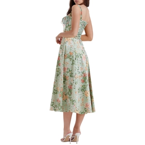 Floral green midi dress with open back and square neck for a summer vacation look