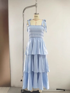Light blue multi-layer tiered summer dress with tie straps and smocked bodice details