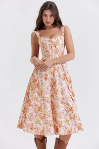 Detailed view of the corset waist structure and floral print on a summer maxi dress