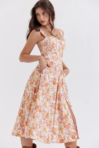 Detail of floral sundress featuring a boned bodice waist and high side leg slit