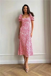 Detail of French vintage floral midi dress with square neck and puff sleeves