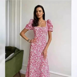 Chic pink floral midi dress with puff sleeves and square neckline for summer elegance