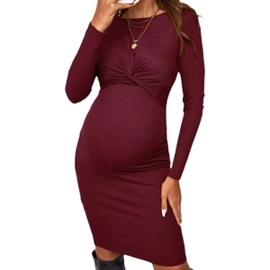 Slim fit burgundy maternity dress with long sleeves and elegant front twist knot detail