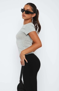 Side view of gray slim fit round neck t-shirt showing body-hugging cut and soft fabric