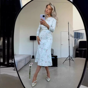 Floral print long sleeve midi dress with slim fit and round neck in mirror selfie view