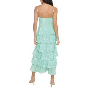 Detail view of tiered mint green floral maxi dress with backless design and thin straps