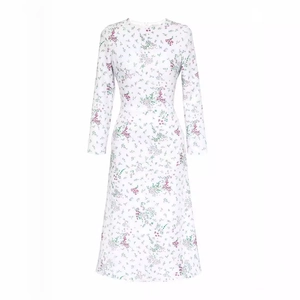 Floral print midi dress with long sleeves and a cinched waist in white and pink