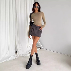 Women's slim fit long sleeve top and grey high-waisted mini skirt outfit set