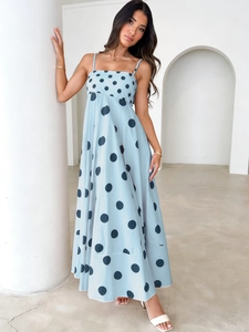 Elegant light blue polka dot maxi dress with high waist and large A-line silhouette