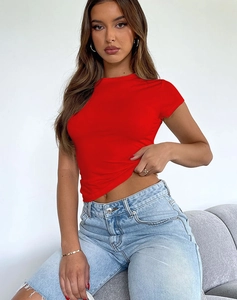 Front view of a slim-fit red crew neck t-shirt worn with light blue denim shorts