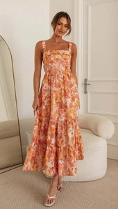 Detail of square neck floral camisole dress with triple-tiered cake hem construction