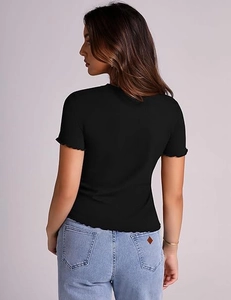 Detail view of black ribbed t-shirt featuring ruffle hem and lettuce edges on the back