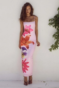 Detailed close-up of vibrant floral print on slim fit pink maxi camisole dress
