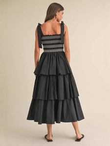 French vintage tiered black midi dress with adjustable tie straps and smocked back detail