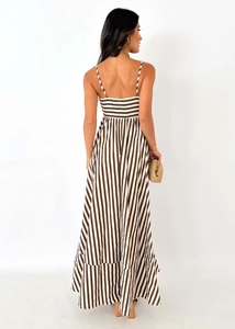 Detail of summer striped backless dress with multi-layered hem and fine spaghetti straps