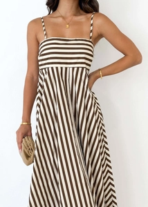Detailed view of the brown striped backless sundress with thin straps and high waist