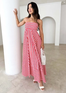Red and white striped summer dress featuring a backless design and flowing high waist maxi skirt