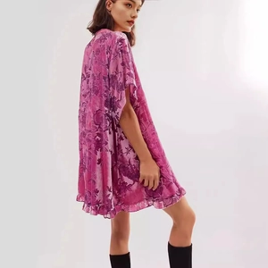 Vintage velvet floral mini dress in hot pink with short sleeves and ruffled hem design
