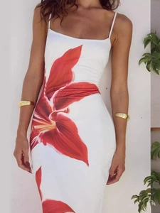 Slim fit white summer dress featuring a bold red floral print and elegant spaghetti straps