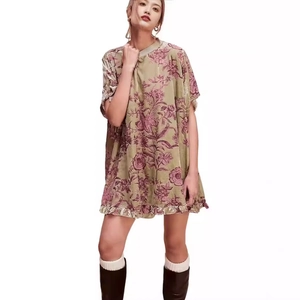 Vintage floral velvet mini dress in olive green with short sleeves and ruffled hemline