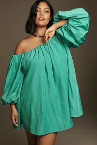 Detailed view of puff sleeves and off-the-shoulder neckline on a green mini dress