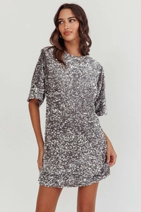 Close-up detail of silver sequin texture on short sleeve velvet party mini dress