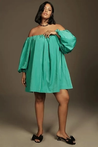 Full view of bright green off-shoulder puff sleeve mini dress with A-line skirt