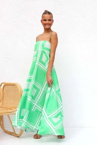 Detail of green and white geometric print on a breezy summer halter maxi dress