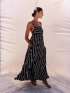 Women's backless striped maxi dress with thin straps and a wide A-line hem for summer