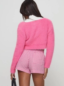 Women's pink mohair sweater and high waist plaid shorts casual outfit set from back view