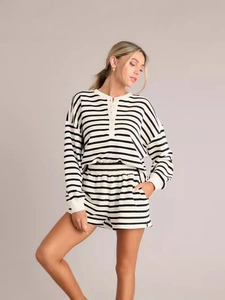 Women's two-piece set with black and white striped long sleeve top and shorts