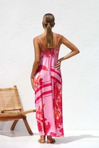 Back view of summer floral maxi dress with backless design and thin straps for vacation