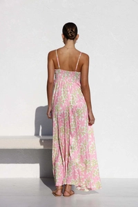 Detail view showing smocking back design and pink floral print on the summer maxi dress