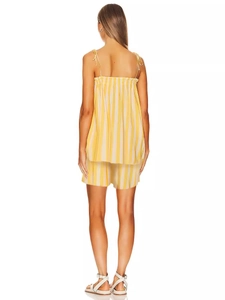 Back view of a yellow and white striped summer camisole and shorts set for women